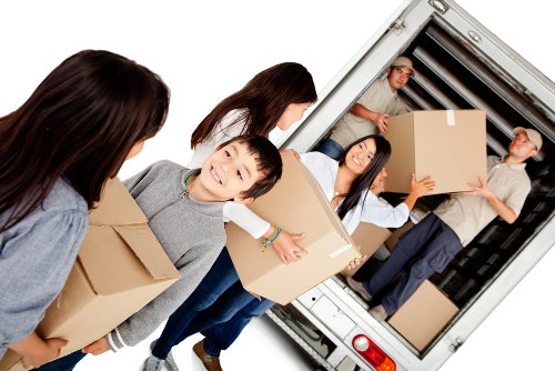 Flat removal movers handling a Shoreditch apartment move with care