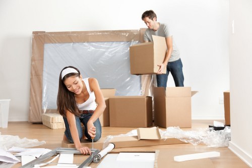 Moving home in Shoreditch with a local removals team handling boxes and furniture