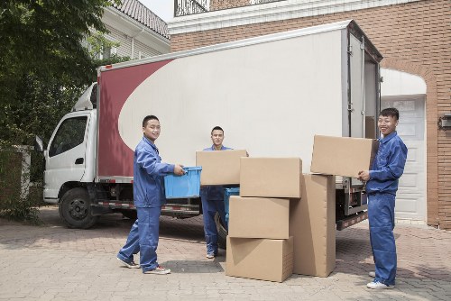 Local movers transporting household items in East London