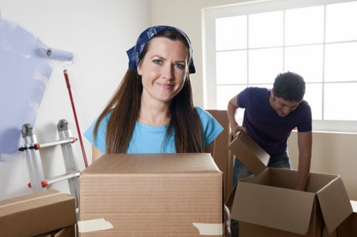 Residential removals support for a flat move in Shoreditch with boxes and furniture