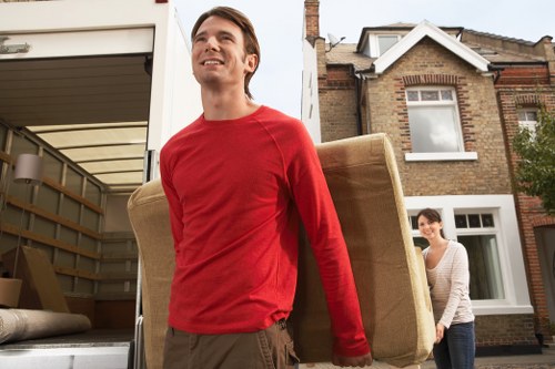 Boxes, furniture, and storage items prepared for a Shoreditch student relocation